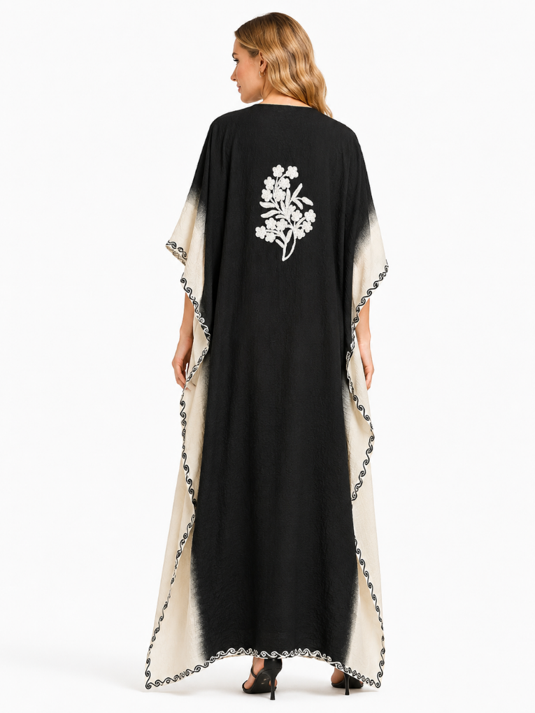 Elegant Black and Ivory Long Kaftaan with Intricate White Floral Embroidery and Decorative Sleeve Detailing
